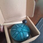 Ethereal Drum, A 3-inch 6-tones Steel Tongue Drum, Is Compact And Portable, Allowing People To Relieve Stress, Heal And Meditate. It Comes With Drumsticks And Music Notes. Eid Al-Adha Mubarak photo review