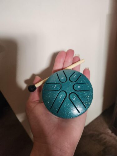 Ethereal Drum, A 3-inch 6-tones Steel Tongue Drum, Is Compact And Portable, Allowing People To Relieve Stress, Heal And Meditate. It Comes With Drumsticks And Music Notes. Eid Al-Adha Mubarak photo review